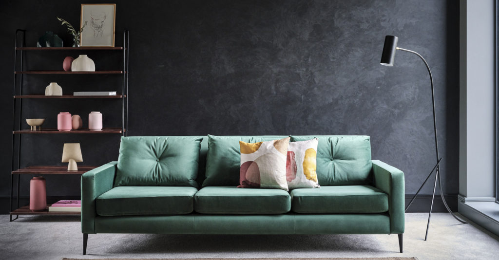 The teal Brunel Sofa in a modern living room