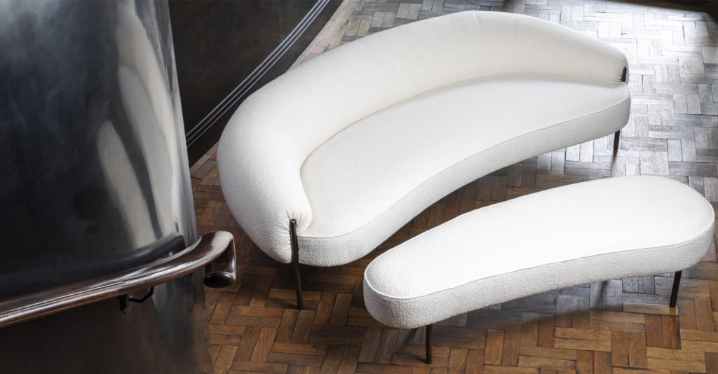 The Isola Sofa with bouclé white upholstery