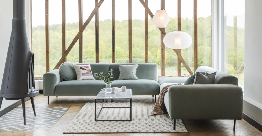 Luna Sofa in a high-ceiling modern living room